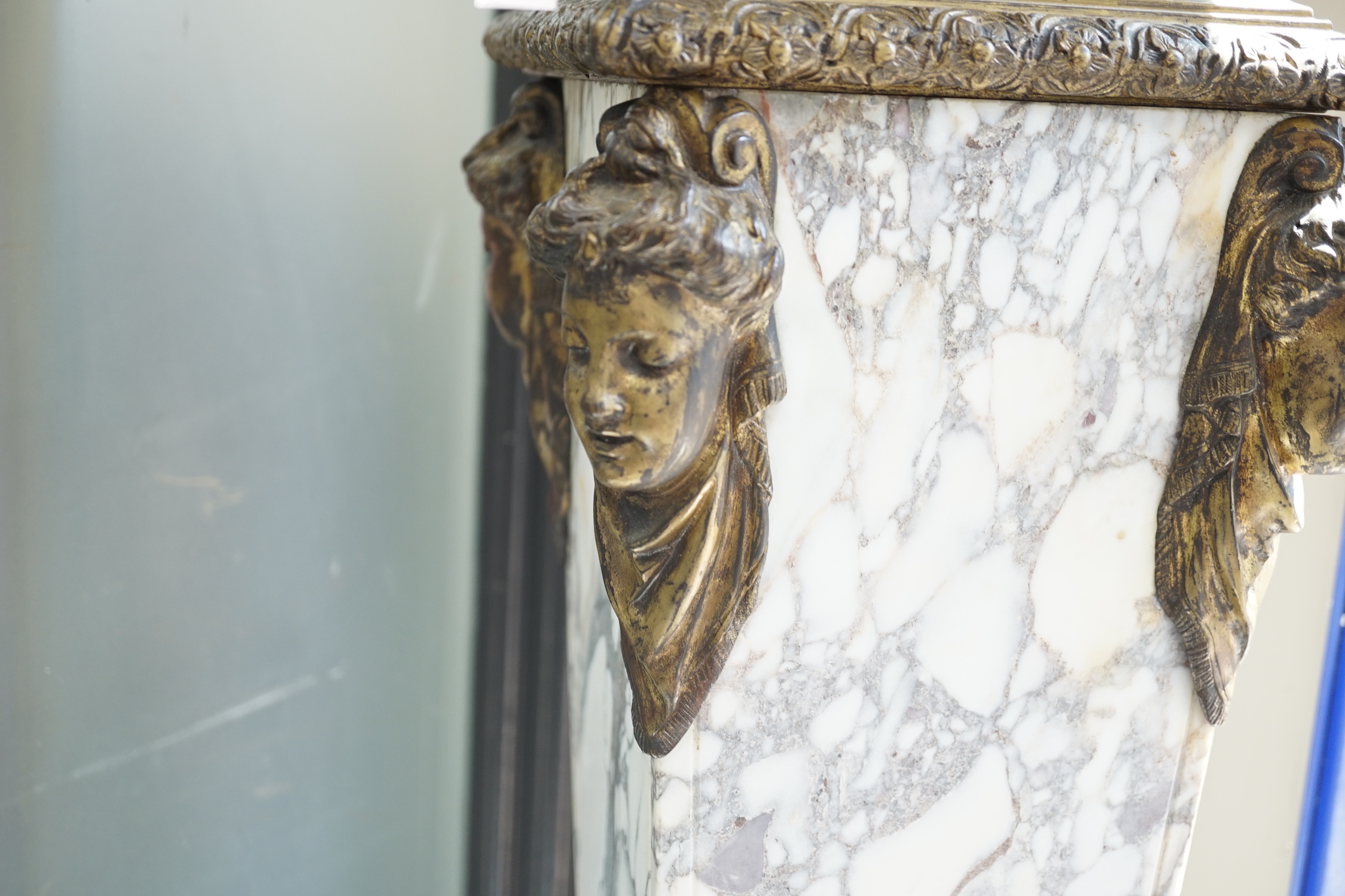 A gilt metal mounted reconstituted marble pedestal, height 113cm